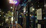 A picture taken on November 21, 2015 shows a note reading "On the advice of the Brussels Police, we will be closing at 18:00" on the door of closed o'reilly's irish pub, on Anspach boulevard in the Bourse / Beurs area in Brussels city center. (Luc Claessen/AFP/ BELGA)