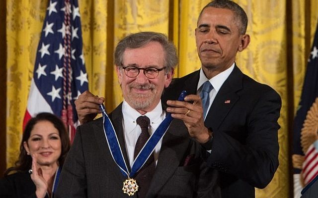 US President Barack Obama presents the Presidential Medal of Freedom to movie director Steven Spielberg at the White House, Washington, DC, November 24, 2015. (AFP/NICHOLAS KAMM) US President Barack Obama presents the Presidential Medal of Freedom to movie director Steven Spielberg at the White House, Washington, DC, November 24, 2015. (AFP/NICHOLAS KAMM)