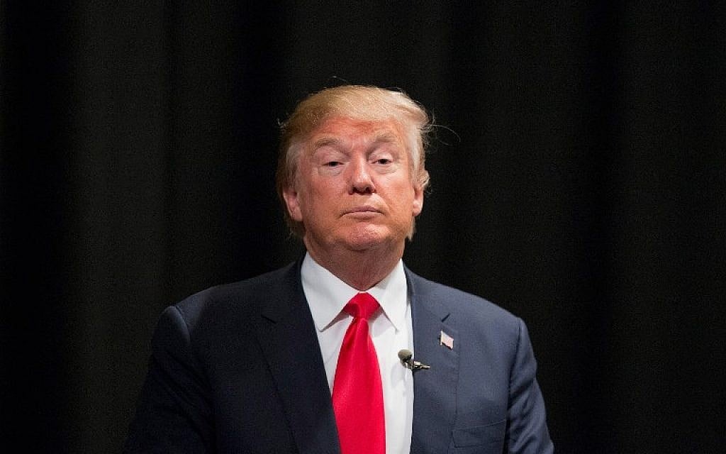 Republican presidential candidate Donald Trump speaks to guests following a town hall meeting in Newton, Iowa, on November 19, 2015. (Scott Olson/Getty Images/AFP)