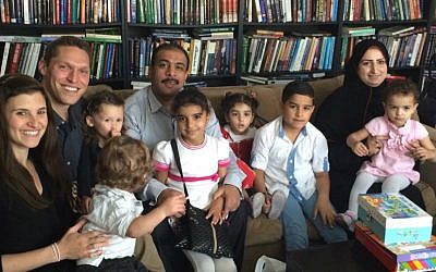 Rabbi Shmuly Yanklowitz (second from left), his wife Shoshana and two children host a newly arrived Syrian refugee family to Phoenix for Thanksgiving, November 26, 2015. (Courtesy)