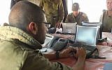 Illustrative: IDF soldiers using the "Hunter" [Tsayad] system. The acronym stands for Digitized Land Army. The system allows multi-tier communications across encrypted platforms and has revolutionized the way combat unit receive and process intelligence. (Courtesy IDF)