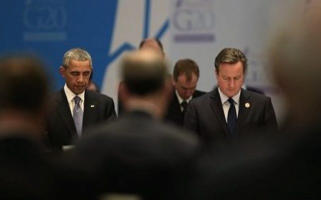 US President Barack Obama, left, and Britain's Prime Minister David Cameron join other leaders in a minute of silence for the victims of the Paris attacks prior to a session of the G-20 summit, in Antalya, Turkey, on November 15, 2015. (AP Photo/Lefteris Pitarakis) US President Barack Obama, left, and Britain's Prime Minister David Cameron join other leaders in a minute of silence for the victims of the Paris attacks prior to a session of the G-20 summit, in Antalya, Turkey, on November 15, 2015. (AP Photo/Lefteris Pitarakis)