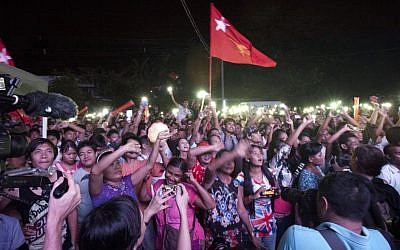 Supporters of Myanmar opposition leader Aung San Suu Kyi’s National League for Democracy party cheer as they watch the result of general election on an LED screen outside the party’s headquarters Sunday, Nov. 8, 2015 in Yangon, Myanmar. (AP Photo/Khin Maung Win) Supporters of Myanmar opposition leader Aung San Suu Kyi’s National League for Democracy party cheer as they watch the result of general election on Nov. 8, 2015 in Yangon, Myanmar. (AP Photo/Khin Maung Win)