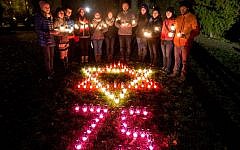 In Warsaw, some 200 Israelis, Poles and American college students took part in an 'active memory' event commemorating 75 years since the establishment of the Warsaw Ghetto, October 31, 2015. (Elan Kawesch/The Times of Israel)