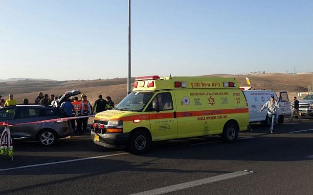 Ambulances arrive on the scene of a car-ramming attack at the Kfar Adumim Junction on November 27, 2015. (Courtesy Magen David Adom) Ambulances arrive on the scene of a car-ramming attack at the Kfar Adumim Junction on November 27, 2015. (Courtesy Magen David Adom)