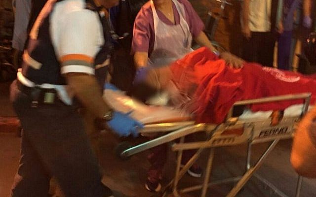 Medics transport victims injured in a stabbing attack in Kiryat Gat to Ashkelon's Barzilai Medical Center on November 21, 2015. (Magen David Adom) Medics transport victims injured in a stabbing attack in Kiryat Gat to Ashkelon's Barzilai Medical Center on November 21, 2015. (Magen David Adom)