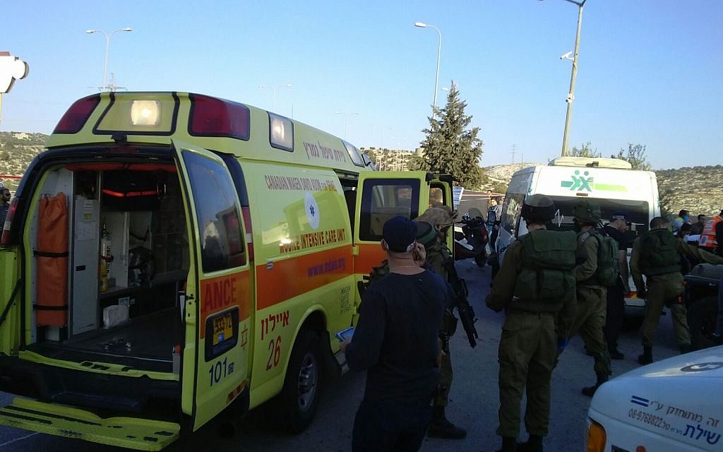Magen David Adom ambulances arrive at the scene of a fatal stabbing attack on Route 443 outside of Jerusalem on November 23, 2015. (Magen David Adom)