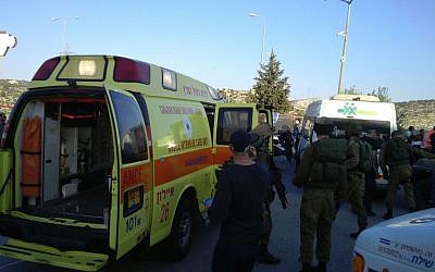 Magen David Adom ambulances arrive at the scene of a fatal stabbing attack on Route 443 outside of Jerusalem on November 23, 2015. (Magen David Adom)