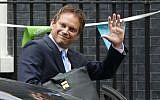 This file photo, dated Oct. 4, 2012, shows Grant Shapps, as he leaves Downing Street in London. (Yui Mok / PA via AP)