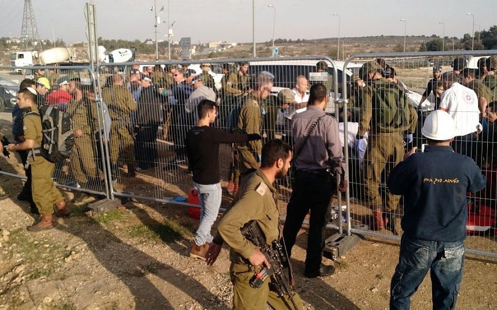 Soldiers respond to the scene of a stabbing terror attack at the Gush Etzion Junction on Sunday, November 22, 2015. (Judah Ari Gross/Times of Israel) Soldiers respond to the scene of a stabbing terror attack at the Gush Etzion Junction on Sunday, November 22, 2015. (Judah Ari Gross/Times of Israel)
