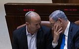 Prime Minister Benjamin Netanyahu, right, with Education Minister Naftali Bennett in the Knesset, June 17, 2015. (Miriam Alster/Flash90)