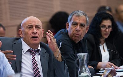 MK Basel Ghattas (left) seen during a Finance committee meeting in the Knesset on October 19, 2015. (Miriam Alster/Flash90)