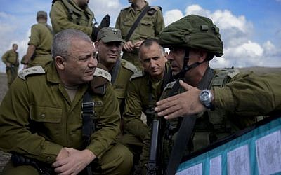 Then-IDF chief of staff Gadi EIsenkot, front left, visits a Golani Brigade exercise in the Golan Heights on Oct. 27, 2015. (IDF Spokesperson's Unit)