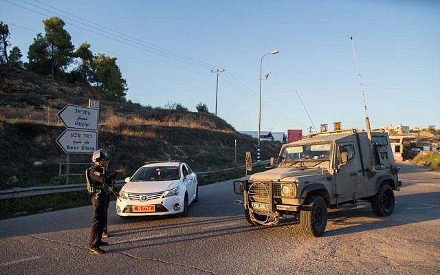 Illustrative. Israeli security forces stand guard in the West Bank on November 13, 2015. (Yonatan SIndel/Flash90) Illustrative. Israeli security forces stand guard in the West Bank on November 13, 2015. (Yonatan SIndel/Flash90)
