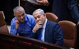 File: Prime Minister Benjamin Netanyahu (right) speaks with Finance Minister Moshe Kahlon during a plenum session at the Knesset on November 16, 2015. (Miriam Alster/Flash90)