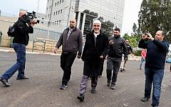 Sheikh Raed Salah, leader of the Northern Branch of the Islamic Movement in Israel, walks away after speaking to the media following the security cabinet's decision to outlaw the movement. (November 17, 2015)