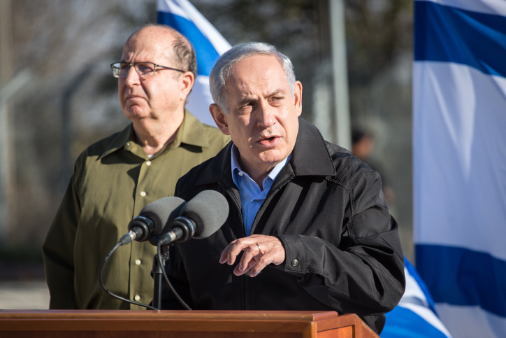 Israeli Prime Minister Benjamin Netanyahu and Defense Minister Moshe Ya'alon give a statement to the media in the Etzion Bloc in the West Bank on November 23, 2015. (Emil Salman/Pool) Israeli Prime Minister Benjamin Netanyahu and Defense Minister Moshe Ya'alon give a statement to the media in the Etzion Bloc in the West Bank on November 23, 2015. (Emil Salman/Pool)