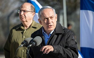 Prime Minister Benjamin Netanyahu (R) and Minister of Defense Moshe Ya'alon at the Etzion Bloc in the West Bank on November 23, 2015. (Emil Salman/Haaretz/Pool)