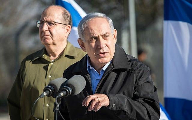 Prime Minister Benjamin Netanyahu (R) and Minister of Defense Moshe Ya'alon at the Etzion Bloc in the West Bank on November 23, 2015. (Emil Salman/Haaretz/Pool) Prime Minister Benjamin Netanyahu (R) and Minister of Defense Moshe Ya'alon at the Etzion Bloc in the West Bank on November 23, 2015. (Emil Salman/Haaretz/Pool)