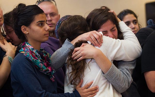 Mourners react during the funeral of Hadar Buchris, 21, in Jerusalem on November 23, 2015. (Mirian Alster/Flash90) Mourners react during the funeral of Hadar Buchris, 21, in Jerusalem on November 23, 2015. (Mirian Alster/Flash90)