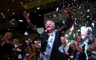 Holocaust survivor Rita Berkowitz, 83 celebrates winning a Holocaust survivors beauty pageant in Haifa on November 24, 2015. (Yonatan Sindel/Flash90)