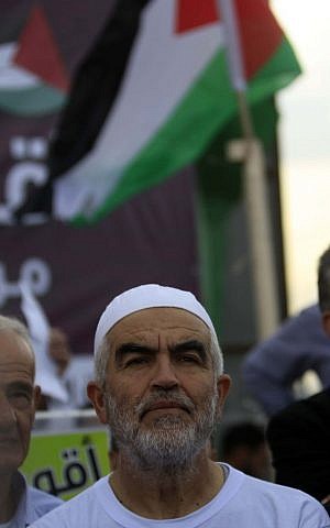 Leader of the Northern Branch of the Islamic Movement in Israel, Sheikh Raed Salah, seen during a demonstration with his supporters against Israel's recent decision to outlaw the Northern Branch, on November 28, 2015, in Umm el Fahm, northern Israel. Salah was recently sentenced to eleven months in prison for incitement to violence and racism against Jews. (Photo by Muammar Awad/Flash90)