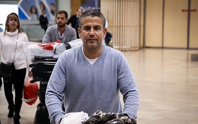 Jewish Home MK Yinon Magal seen arriving at Ben Gurion International Airport on November 30, 2015. (Flash90)
