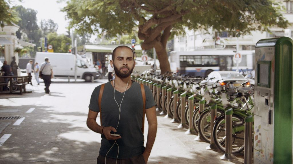 Fadi wanders the streets of Tel Aviv in British director and producer Jake Witzenfeld's 'Oriented.' (courtesy) Naim wanders the streets of Tel Aviv in British director and producer Jake Witzenfeld's 'Oriented.' (courtesy)