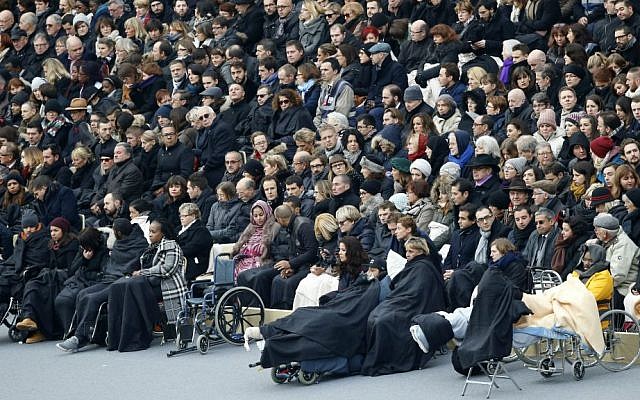 Wounded people in the Nov. 13 Paris attacks wait for the start of a ceremony in the courtyard of the Invalides in Paris, Friday, Nov. 27, 2015. (AP Photo/Francois Mori) Wounded people in the Nov. 13 Paris attacks wait for the start of a ceremony in the courtyard of the Invalides in Paris, Friday, Nov. 27, 2015. (AP Photo/Francois Mori)