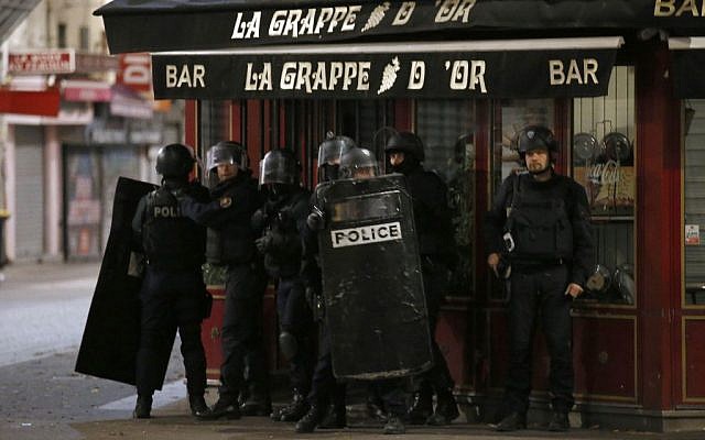 Police forces prepare in Saint Denis, a northern suburb of Paris, Wednesday, Nov. 18, 2015 (AP Photo/Francois Mori) Police forces prepare in Saint Denis, a northern suburb of Paris, Wednesday, Nov. 18, 2015 (AP Photo/Francois Mori)