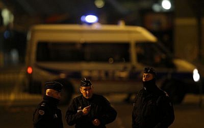 Police officers stand guard outside the Stade de France stadium after an international friendly soccer match France against Germany, in Saint Denis, outside Paris, Friday November 13, 2015. During the first half of France's soccer match against Germany on Friday, two explosions went off nearby. (Photo by AP Photo/Michel Euler)