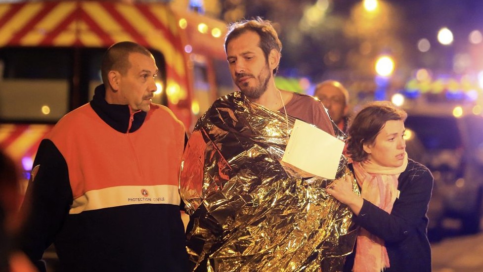 A man is being evacuated from the Bataclan theater after a shooting in Paris, Friday Nov. 13, 2015. (AP/Thibault Camus) A man is being evacuated from the Bataclan theater after a shooting in Paris, Friday Nov. 13, 2015. (AP/Thibault Camus)