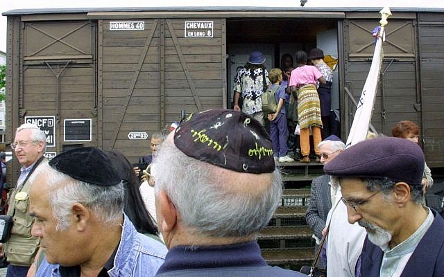 Illustrative: This Monday August20, 2001, file photo shows French Holocaust survivors gathering at the site of the former Drancy detention camp, north of Paris. (AP Photo/Michel Euler, File) Illustrative: This Monday August20, 2001, file photo shows French Holocaust survivors gathering at the site of the former Drancy detention camp, north of Paris. (AP Photo/Michel Euler, File)