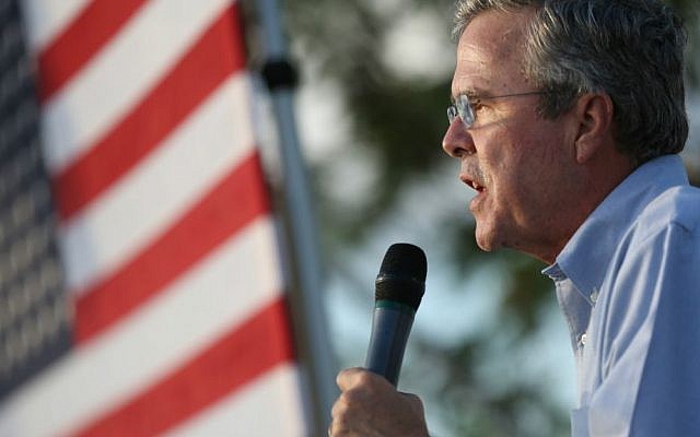 Republican presidential candidate and former Florida governor Jeb Bush speaks at an outdoor rally before attending a high school football game in Punta Gorda, Florida, Friday, Oct. 30, 2015. (Dorothy Edwards/Naples Daily News via AP)
