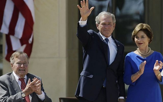 In this April 25, 2013, file photo, Former President George H.W. Bush, left, applauds with Laura Bush after former President George W. Bush's speech during the dedication of the George W. Bush Presidential Center in Dallas. (AP Photo/David J. Phillip, File) In this April 25, 2013, file photo, Former President George H.W. Bush, left, applauds with Laura Bush after former President George W. Bush's speech during the dedication of the George W. Bush Presidential Center in Dallas. (AP Photo/David J. Phillip, File)