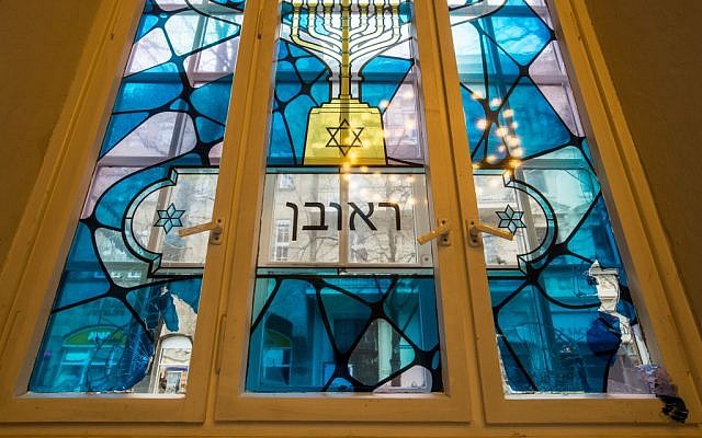 A smashed stained glass window photographed in the synagogue in Cottbus, eastern Germany, Wednesday November 18, 2015. (Patrick Pleul/dpa via AP) 