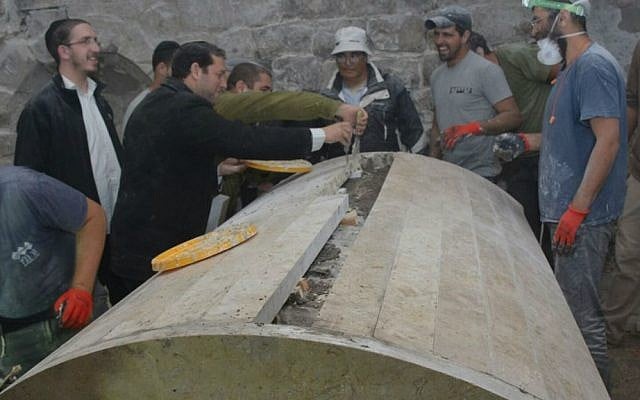 Repairs are carried out at Joseph's Tomb on the outskirts of Nablus, overnight November 2, 2015. (Meir Brachia) Repairs are carried out at Joseph's Tomb on the outskirts of Nablus, overnight November 2, 2015. (Meir Brachia)