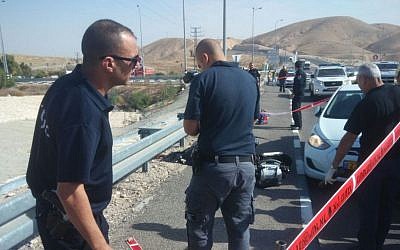 Israeli police and security forces at the scene of an attempted car-ramming and stabbing attack near Kfar Adumim, on Sunday November 22 2015. (Courtesy)