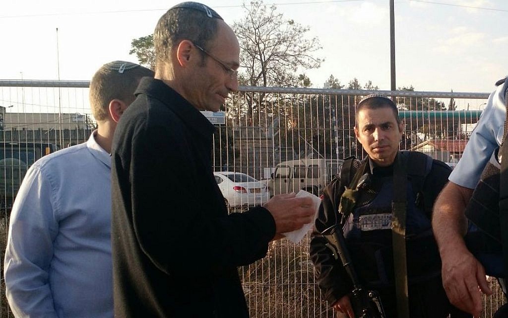 Davidi Perl, the head of the Etzion Regional Council at the scene of a stabbing terror attack in the Etziyon Junction on Sunday, November 22, 2015. (Judah Ari Gross/Times of Israel) Davidi Perl, the head of the Etzion Regional Council at the scene of a stabbing terror attack in the Etziyon Junction on Sunday, November 22, 2015. (Judah Ari Gross/Times of Israel)