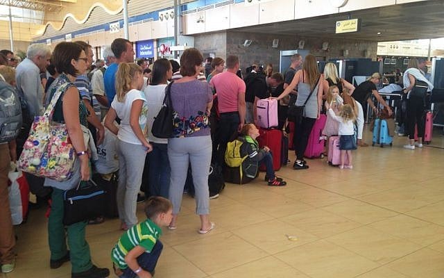 Tourists wait in line at the security gate before the check-in counter at Sharm el-Sheikh International Airport, south Sinai, Egypt, November 6, 2015. (AP/Thomas Hartwell) Tourists wait in line at the security gate before the check-in counter at Sharm el-Sheikh International Airport, south Sinai, Egypt, November 6, 2015. (AP/Thomas Hartwell)
