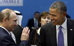 In this Monday, Nov. 16, 2015 file photo, US President Barack Obama, right, talks with Russian President Vladimir Putin prior to a session of the G-20 Summit in Antalya, Turkey. (Kayhan Ozer/Anadolu Agency via AP, Pool)