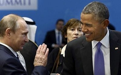 In this Monday, Nov. 16, 2015 file photo, US President Barack Obama, right, talks with Russian President Vladimir Putin prior to a session of the G-20 Summit in Antalya, Turkey. (Kayhan Ozer/Anadolu Agency via AP, Pool)