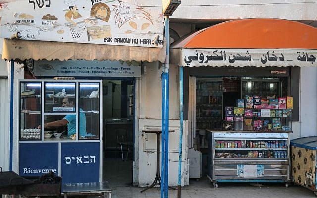 Yona Sabbagh, 38, works in his Brik restaurant at Hara Kbira, the main Jewish neighborhood on the Island of Djerba, southern Tunisia, October 29, 2015. (Photo by AP Photo/Mosa'ab Elshamy)
