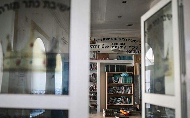 Jewish holy books are seen at a library at Hara Kbira, the main Jewish neighborhood on the Island of Djerba, southern Tunisia, October 29, 2015. (Photo by AP Photo/Mosa'ab Elshamy)