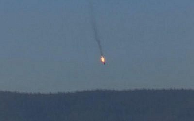 A Russian warplane on fire before crashing on a hill as seen from Hatay province, Tuesday, November 24, 2015. (screen capture: Haberturk TV via AP) A Russian warplane on fire before crashing on a hill as seen from Hatay province in southern Turkey, Tuesday, November 24, 2015. (screen capture: Haberturk TV via AP)
