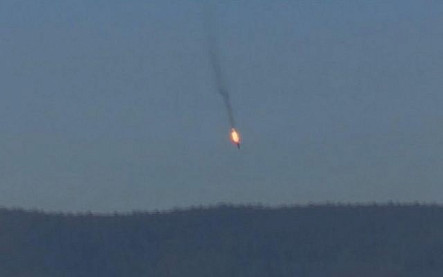 A Russian warplane on fire before crashing on a hill as seen from Hatay province, Tuesday, November 24, 2015. (screen capture: Haberturk TV via AP) A Russian warplane on fire before crashing on a hill as seen from Hatay province, Tuesday, November 24, 2015. (screen capture: Haberturk TV via AP)