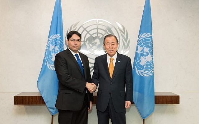 Israel's UN envoy, Danny Danon, poses with UN Secretary General Ban Ki-moon during a meeting on Monday, November 2, 2015 (Shahar Azran)