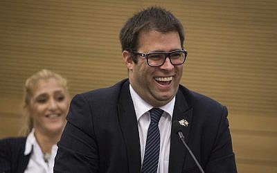 Likud MK Oren Hazan laughing at a Knesset committee meeting in Jerusalem, October 26, 2015. (Hadas Parush/Flash90)