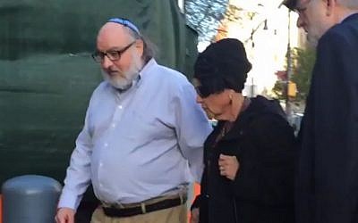 In this still image from video provided by WCBS-TV, convicted spy Jonathan Pollard, left, arrives at a federal courthouse in New York with his wife, Esther, to check in at a probation office just hours after he was released from prison on Friday, Nov. 20, 2015. (Ilana Gold/WCBS-TV via AP) In this still image from video provided by WCBS-TV, convicted spy Jonathan Pollard, left, arrives at a federal courthouse in New York with his wife, Esther, to check in at a probation office just hours after he was released from prison on Friday, Nov. 20, 2015. (Ilana Gold/WCBS-TV via AP)
