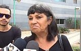 Ruti Malka, daughter of an 80-year-old woman stabbed in a Rishon Lezion terror attack, speaks to the press on November 3, 2015. (screen capture: Channel 2)